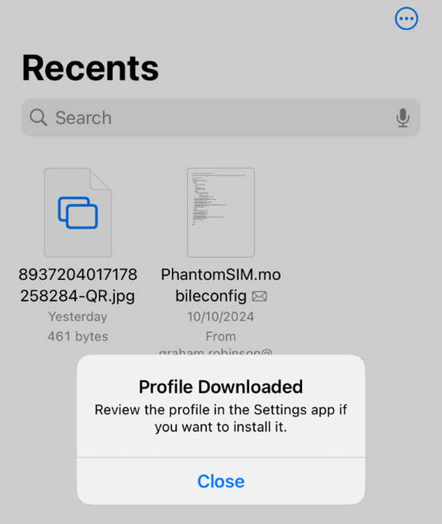 Apple iOS Files app showing Profile Downloaded confirmation popup after downloading the KeySIM APN profile